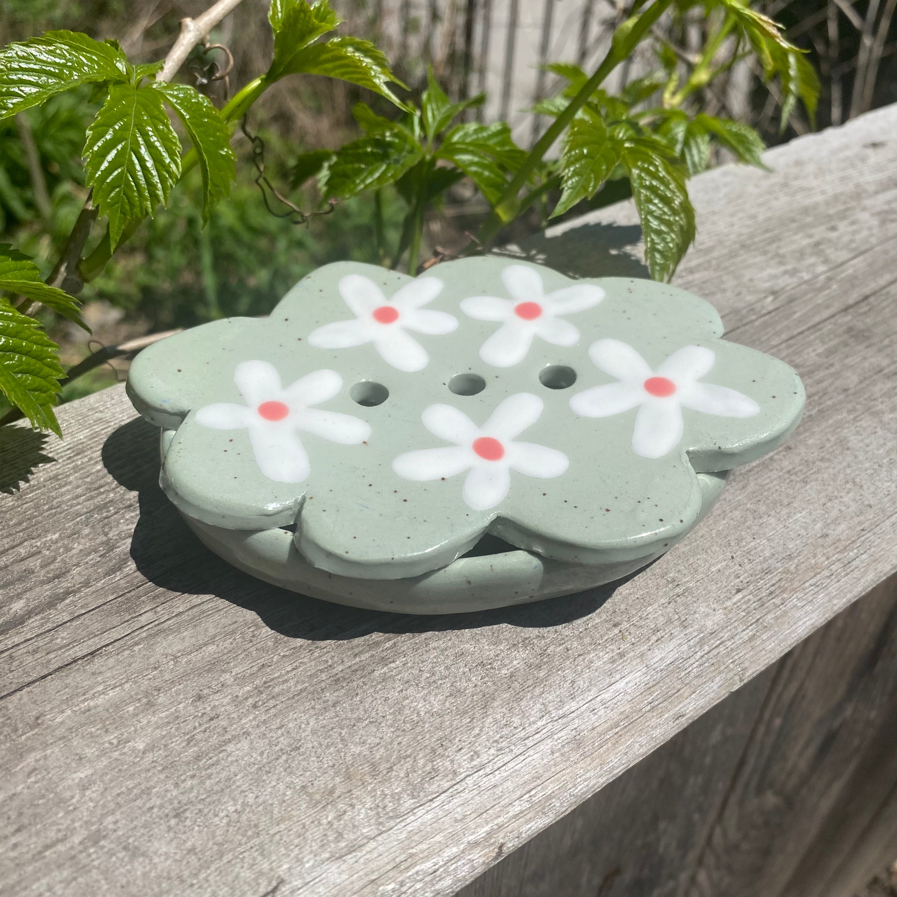 daisy soap dish on sage green clay