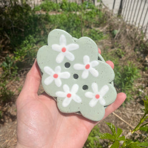 daisy soap dish on sage green clay
